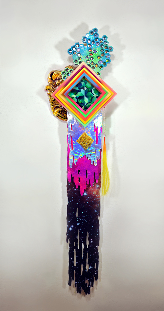 Hilary White works with paint, resin, glitter, holographic cloth, punk spikes and hair to create hand cut wood sculpture